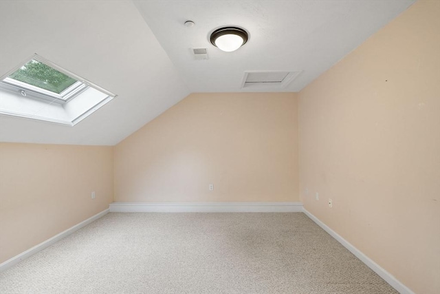 15 Pebble Bch Unit 2005-103, Mashpee, MA 02649 - bonus room featuring lofted ceiling, carpet, and a skylight