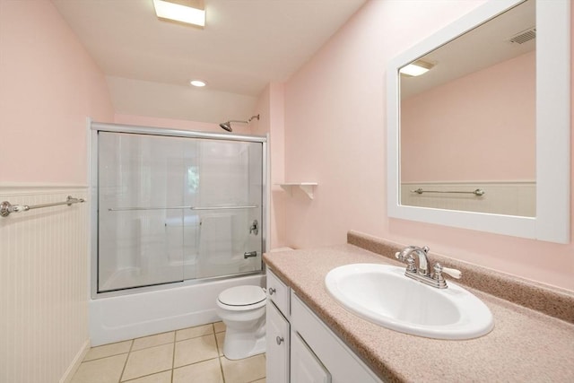 15 Pebble Bch Unit 2005-103, Mashpee, MA 02649 - full bath featuring vanity, bath / shower combo with glass door, and tile patterned floors