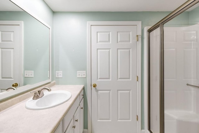 15 Pebble Bch Unit 2005-103, Mashpee, MA 02649 - bathroom with vanity and a stall shower