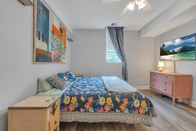 28 Broad St Unit 203, Marlborough, MA 01752 - bedroom with wood finished floors and a ceiling fan