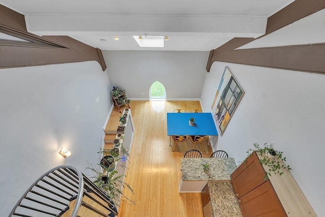 28 Broad St Unit 203, Marlborough, MA 01752 - living area with wood finished floors and a skylight