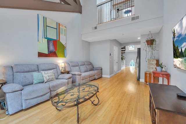 28 Broad St Unit 203, Marlborough, MA 01752 - living room with light wood finished floors and baseboards