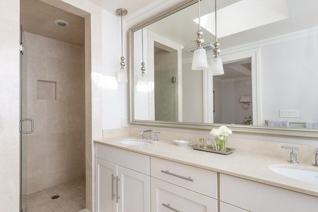 392 Marlborough St Unit 3, Boston, MA 02115 - bathroom with a shower stall, ornamental molding, double vanity, and a sink