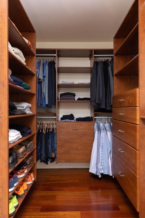 392 Marlborough St Unit 3, Boston, MA 02115 - walk in closet featuring dark wood-style floors
