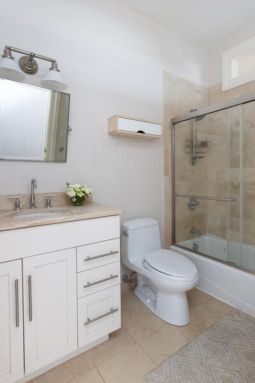 392 Marlborough St Unit 3, Boston, MA 02115 - full bath with toilet, enclosed tub / shower combo, tile patterned flooring, and vanity