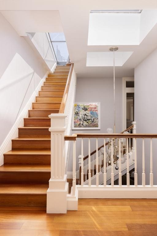 392 Marlborough St Unit 3, Boston, MA 02115 - stairs featuring wood finished floors