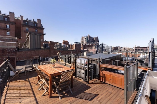 392 Marlborough St Unit 3, Boston, MA 02115 - wooden terrace with outdoor dining area