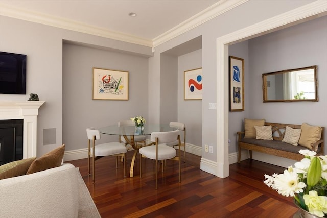 392 Marlborough St Unit 3, Boston, MA 02115 - dining area with a fireplace, dark wood-style flooring, ornamental molding, and baseboards