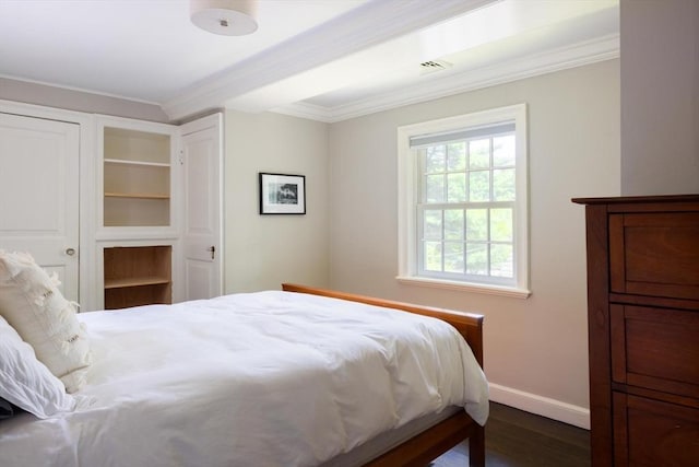 86 Waban Ave, Newton, MA 02468 - bedroom with crown molding, wood finished floors, and a closet