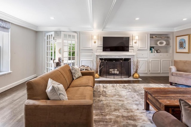 86 Waban Ave, Newton, MA 02468 - living area featuring crown molding, wood finished floors, and a high end fireplace