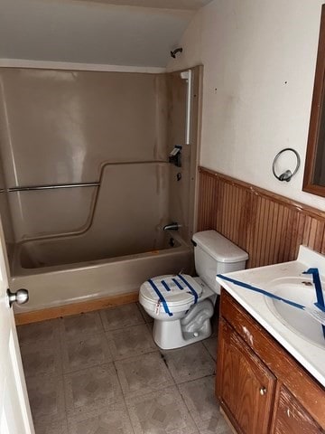 full bathroom featuring shower / bathing tub combination, vanity, and toilet