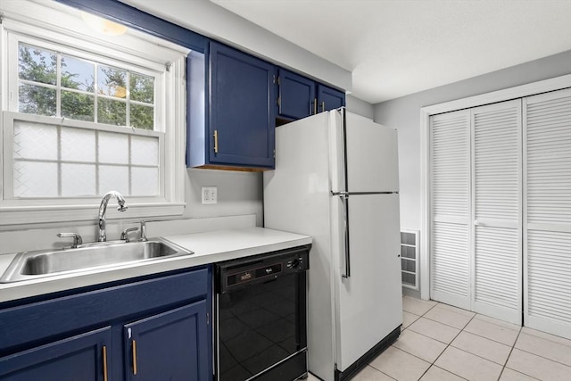 728 Auburn St Unit E4, Whitman, MA 02382 - kitchen featuring dishwasher, blue cabinetry, freestanding refrigerator, light tile patterned floors, and light countertops