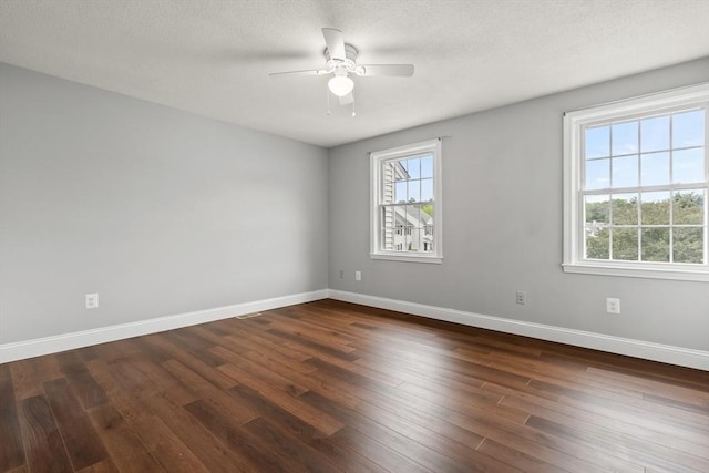 728 Auburn St Unit E4, Whitman, MA 02382 - empty room featuring a ceiling fan, dark wood-type flooring, and a textured ceiling