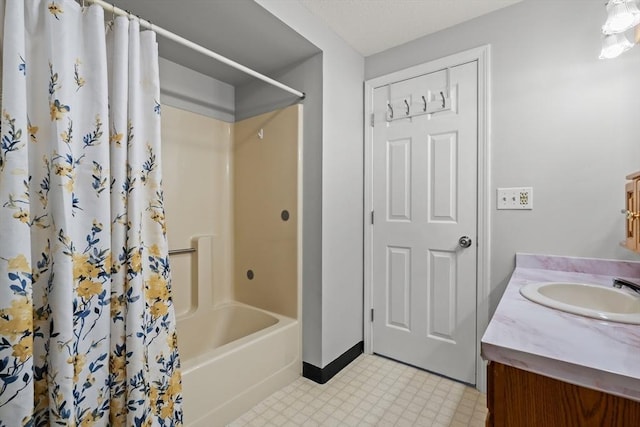 728 Auburn St Unit E4, Whitman, MA 02382 - full bath featuring vanity, tile patterned floors, and shower / bath combo with shower curtain