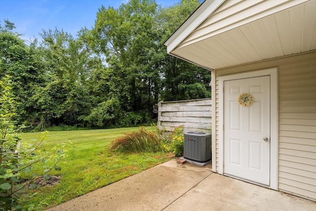 728 Auburn St Unit E4, Whitman, MA 02382 - property entrance featuring a patio area, a lawn, and view of scattered trees