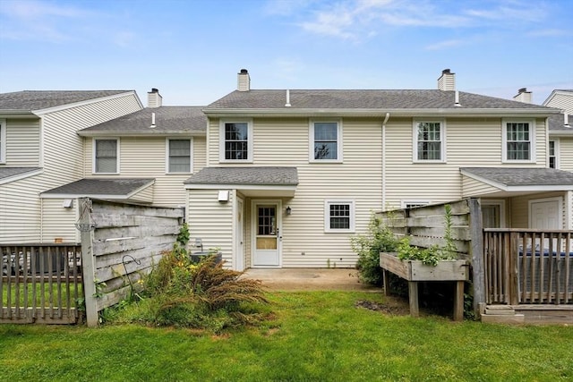 728 Auburn St Unit E4, Whitman, MA 02382 - back of property with a chimney