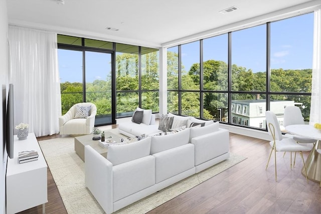 sunroom / solarium featuring plenty of natural light