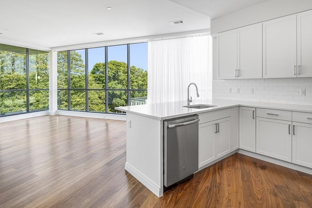 kitchen featuring white cabinetry and stainless steel dishwasher