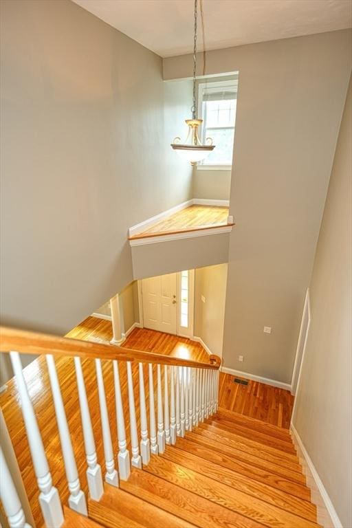 39 Balancing Rock Dr Unit 39, Holliston, MA 01746 - stairs featuring wood finished floors and baseboards