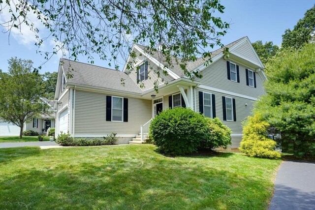 39 Balancing Rock Dr Unit 39, Holliston, MA 01746 - traditional home featuring a front lawn and an attached garage