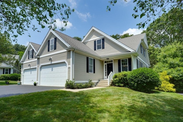 39 Balancing Rock Dr Unit 39, Holliston, MA 01746 - traditional-style home featuring driveway, a front lawn, and a garage