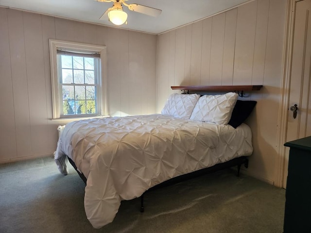 bedroom with ceiling fan and carpet