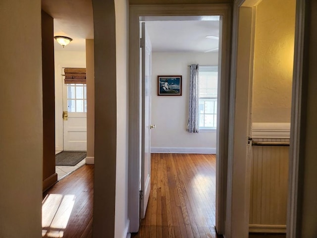 corridor featuring light hardwood / wood-style floors