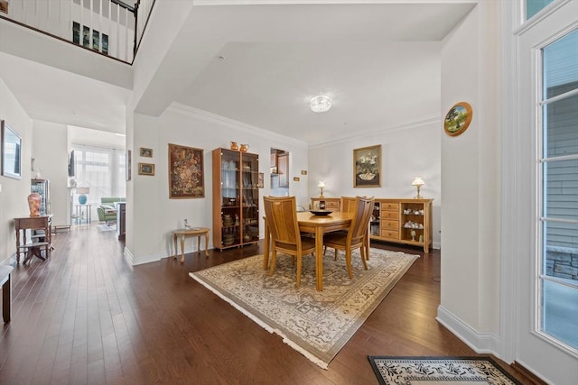 4 Helen Ln Unit 4, Millis, MA 02054 - dining space featuring dark wood-style flooring, baseboards, and crown molding
