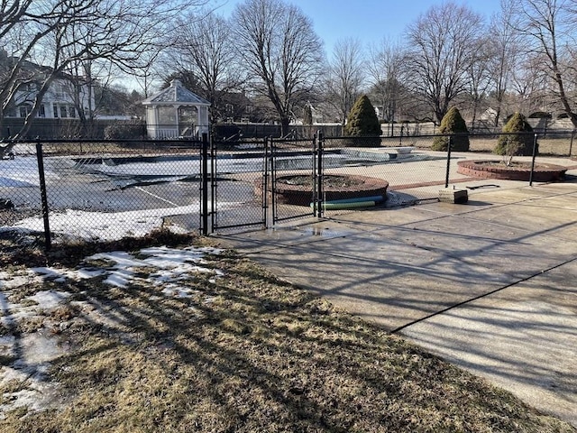 view of street featuring a gate