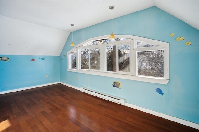 bonus room with baseboard heating, hardwood / wood-style floors, and lofted ceiling