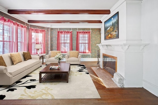 living room with hardwood / wood-style floors and beamed ceiling