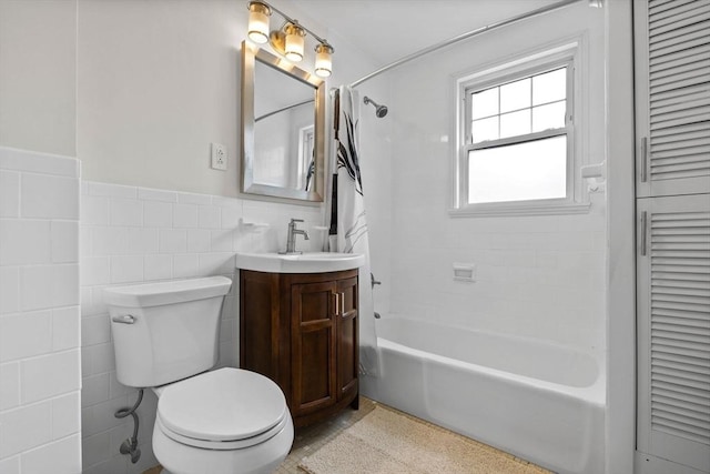 37 Fountain Rd Unit 2, Arlington, MA 02476 - bathroom featuring tile walls, a closet, shower / bathtub combination, toilet, and vanity