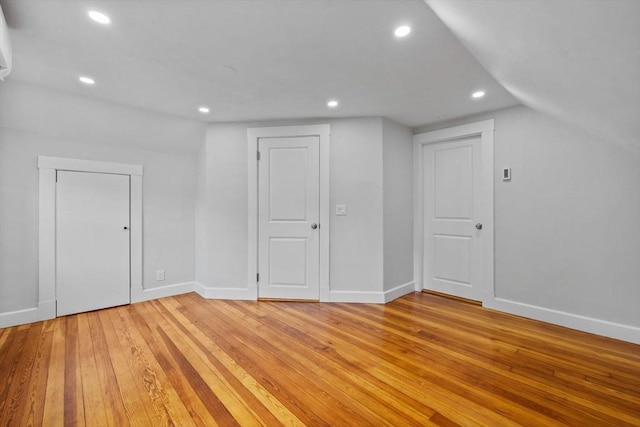 37 Fountain Rd Unit 2, Arlington, MA 02476 - additional living space with light wood finished floors, baseboards, recessed lighting, and vaulted ceiling