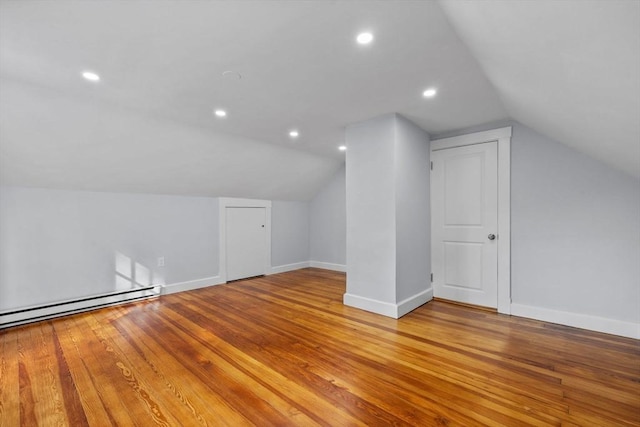 37 Fountain Rd Unit 2, Arlington, MA 02476 - bonus room with vaulted ceiling, baseboards, wood finished floors, recessed lighting, and a baseboard radiator