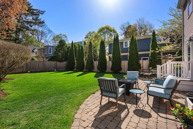 view of yard with a patio and a fenced backyard