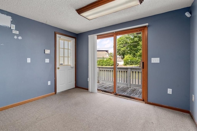 1 Joy St, Franklin, MA 02038 - doorway featuring carpet floors and a textured ceiling