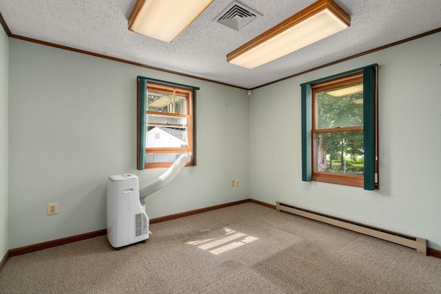 1 Joy St, Franklin, MA 02038 - carpeted empty room featuring a baseboard radiator, ornamental molding, and a textured ceiling