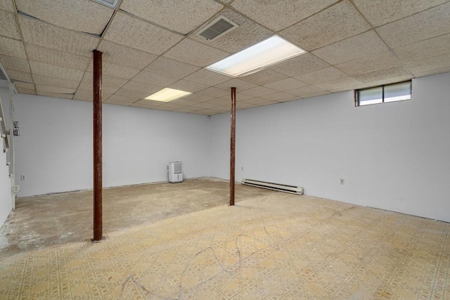 1 Joy St, Franklin, MA 02038 - basement featuring a baseboard radiator, carpet, and a drop ceiling