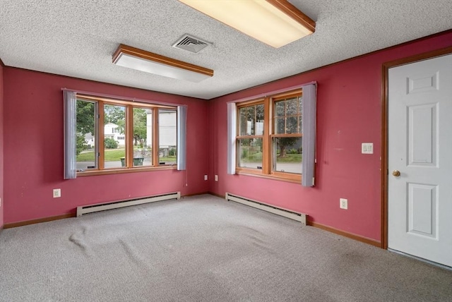 1 Joy St, Franklin, MA 02038 - empty room featuring baseboard heating, a textured ceiling, and carpet flooring