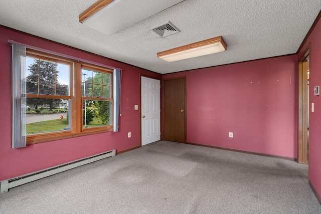 1 Joy St, Franklin, MA 02038 - spare room featuring a baseboard radiator, a textured ceiling, and carpet flooring