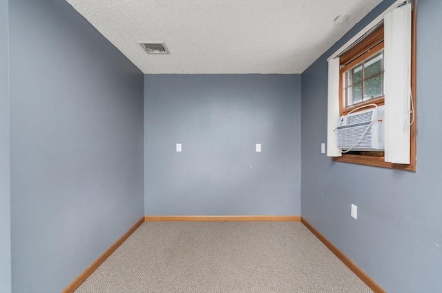 1 Joy St, Franklin, MA 02038 - carpeted spare room featuring a textured ceiling and cooling unit