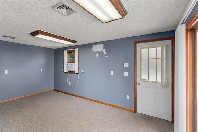 1 Joy St, Franklin, MA 02038 - carpeted empty room with a textured ceiling and cooling unit