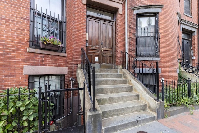 681 Massachusetts Ave Unit D, Boston, MA 02118 - doorway to property featuring brick siding