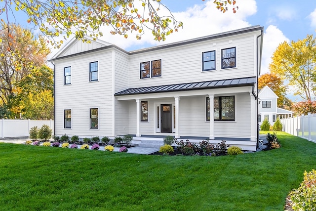 modern farmhouse with a front yard