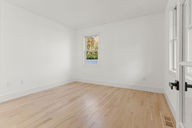 empty room with light wood-type flooring