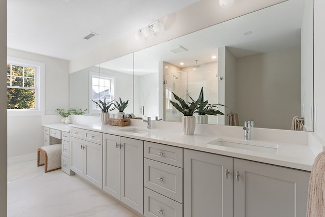 bathroom featuring vanity and walk in shower