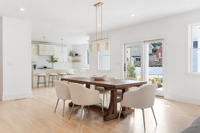 dining room with light wood-type flooring