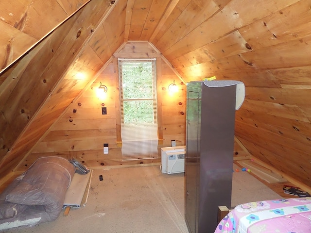 bedroom with lofted ceiling and wood walls