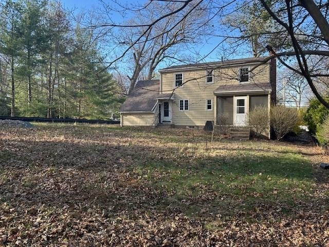 283 Woodland Rd, Newton, MA 02466 - rear view of property with a chimney