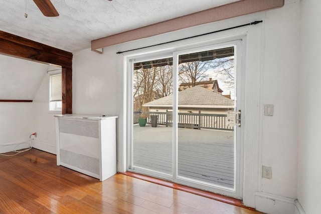 18 Newhall St, Malden, MA 02148 - doorway to outside with wood finished floors, ceiling fan, and lofted ceiling